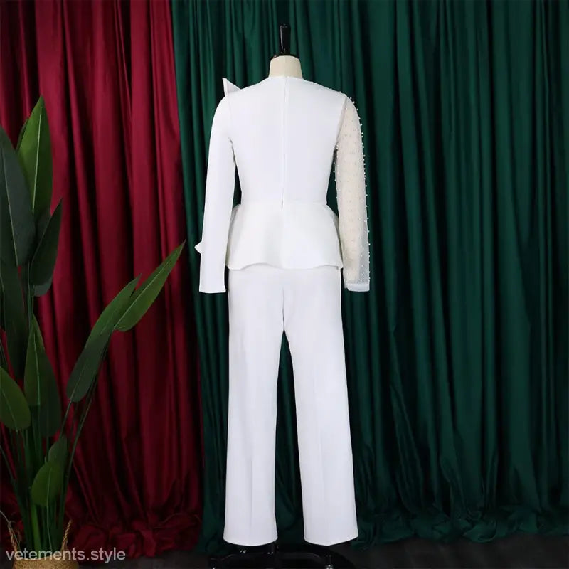 White asymmetrical mesh beaded jumpsuit from Elegant Mesh Beaded Jumpsuit collection