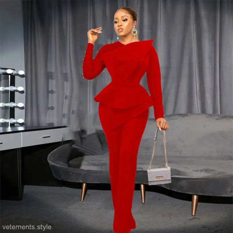 Elegant mesh beaded jumpsuit featuring a striking red peplum pantsuit design