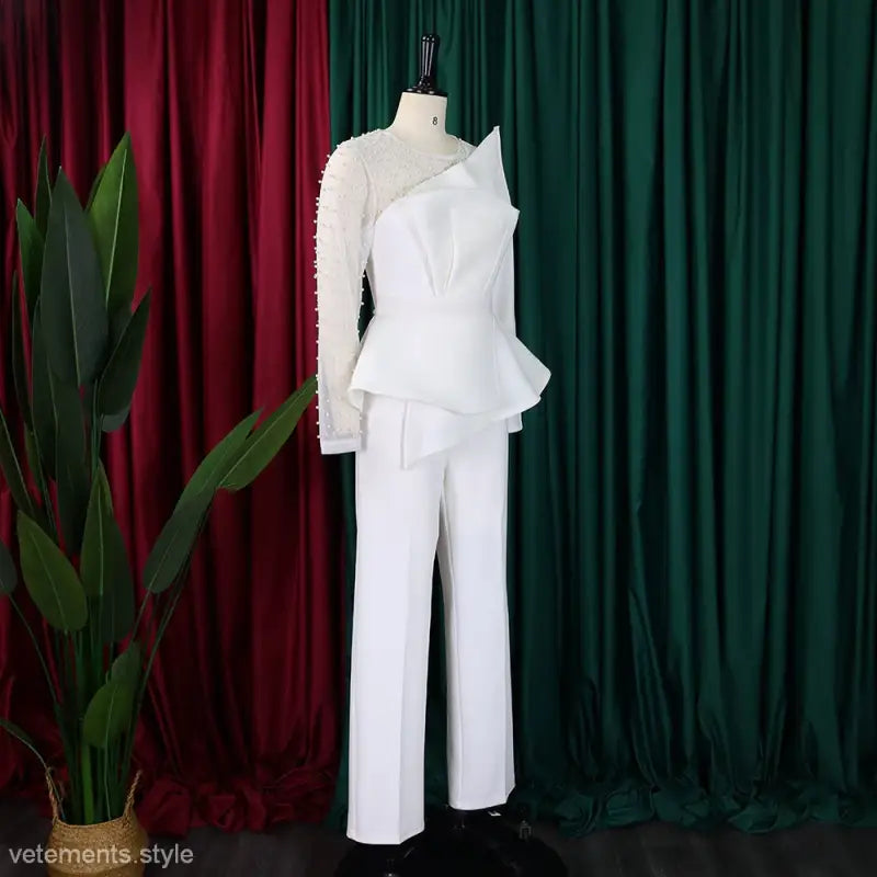 Elegant mesh beaded jumpsuit featuring white asymmetrical peplum pantsuit design