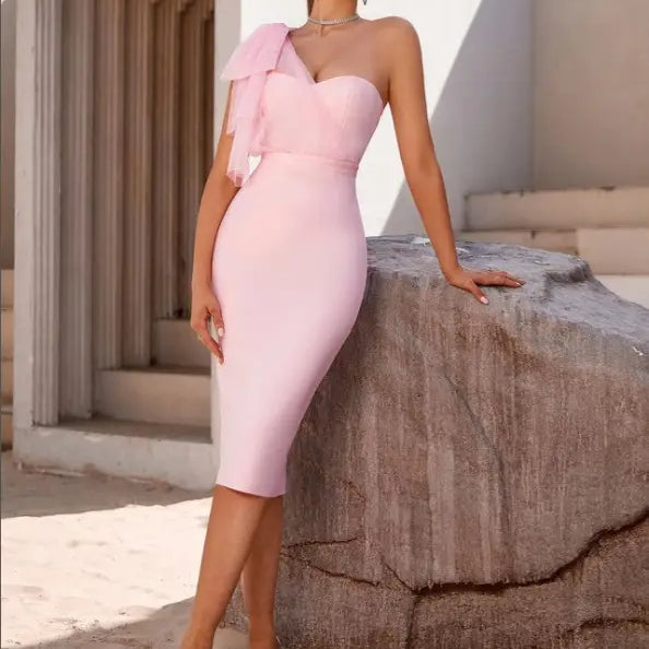 Pink one-shoulder bandage dress showcasing sexy mesh fishtail slim design and lace detailing