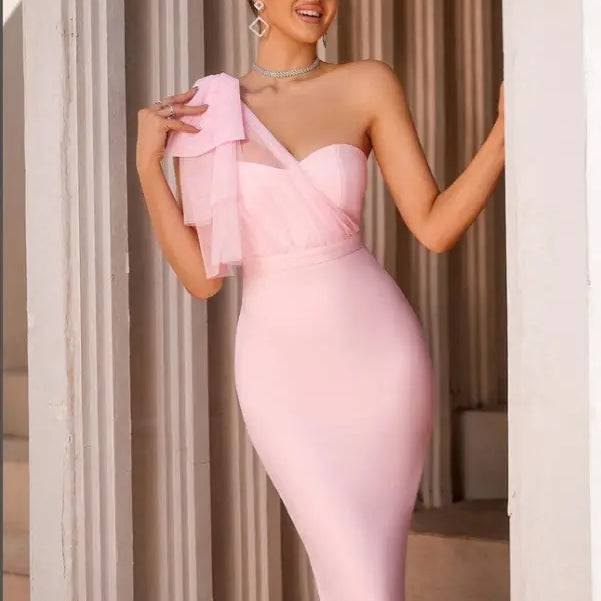 Pink one-shoulder bandage dress featuring sexy mesh fishtail and asymmetric lace detail