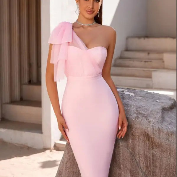 Pink one-shoulder bandage dress showcasing sexy mesh fishtail and asymmetric lace detailing