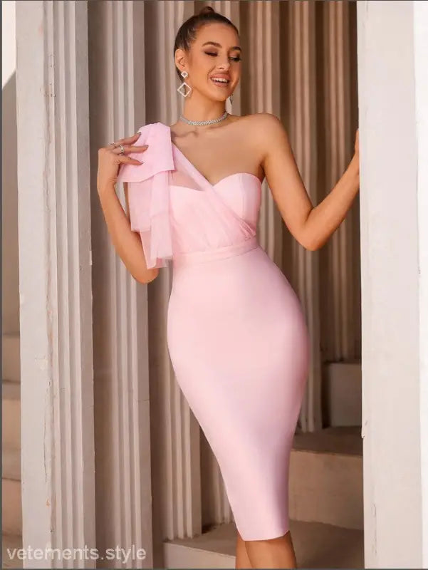 Pink one-shoulder bandage dress showcasing sexy mesh fishtail slim design with lace detailing