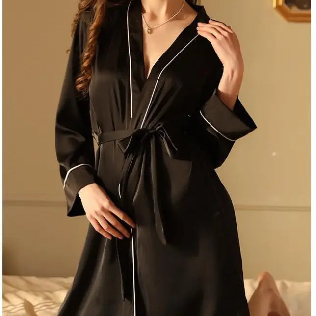 Black silk robe with white piping and tie waist, part of the sexy midi silk pajamas collection
