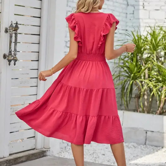 Vibrant red tiered midi dress with ruffled cap sleeves and fitted waist for elegant styling