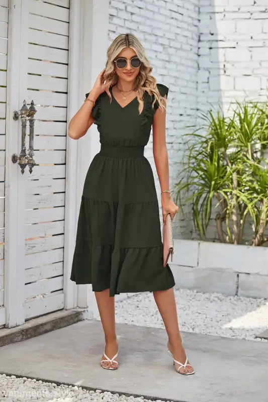 Dark green midi dress with V-neck and tiered skirt in elegant waist pleated style