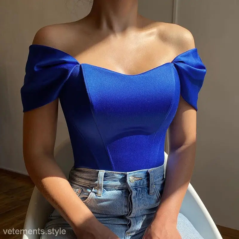 Elegant royal blue off-the-shoulder satin crop top with soft outdoor boning corset