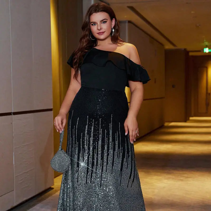 Elegant one shoulder sequin maxi dress for cocktail evenings with silver skirt and handbag