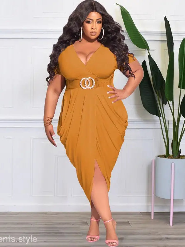 Elegant plunge sexy dress featuring a tight split and belted detail in mustard yellow