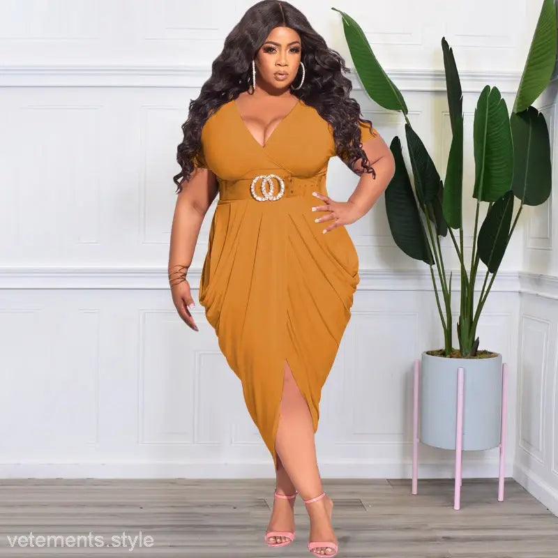 Elegant plunge sexy dress featuring a tight split and belted detail in mustard yellow