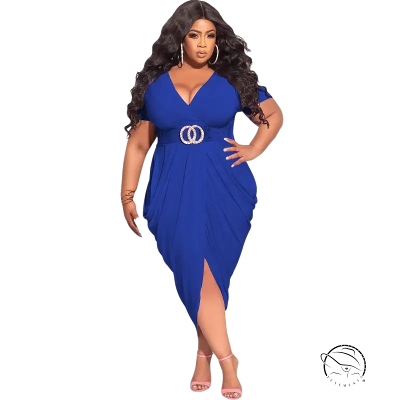 Woman in plunge sexy dress with cinched waist, asymmetrical design, and front slit