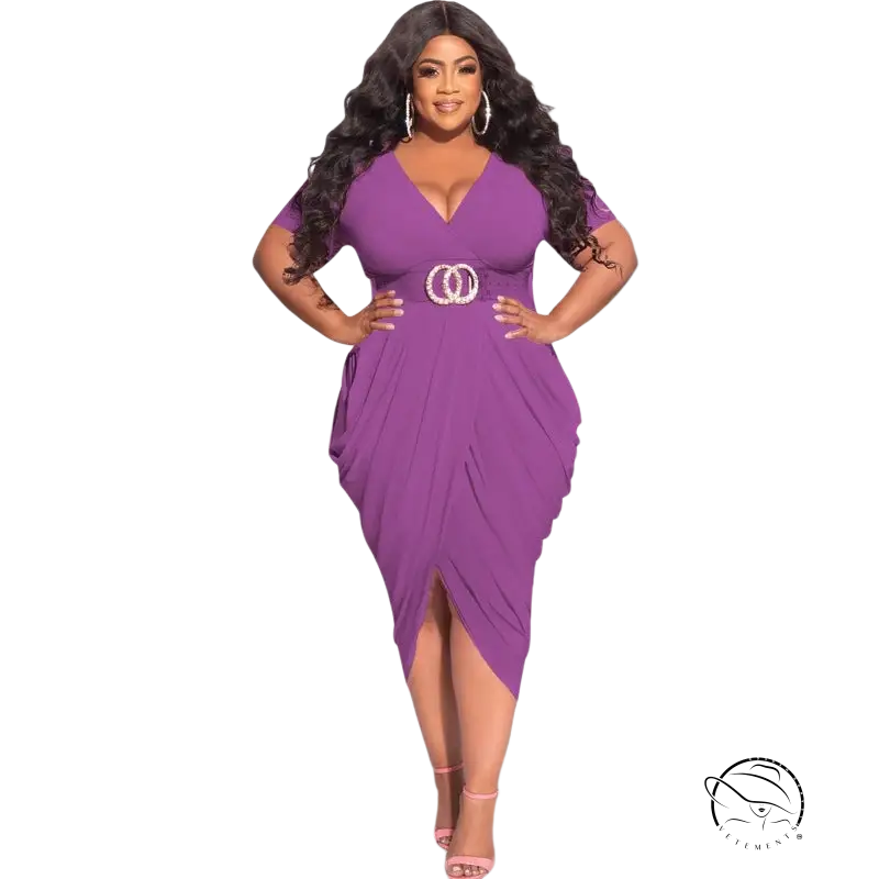 Curvy woman in sexy plunge dress with belted waist and asymmetrical split