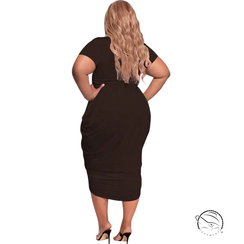 Woman in sexy tight split plunge dress with asymmetrical belted design