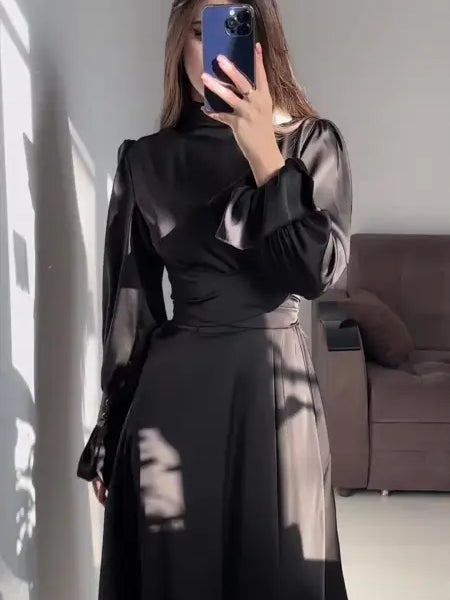 Elegant Puff Sleeve Ruffled Maxi Dress with Belted Mock Neck showcasing a black sleeve dress