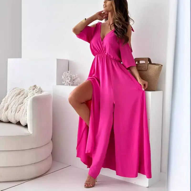 Sexy sling mid length dress in rose red featuring a hot pink hue and thigh-high slit