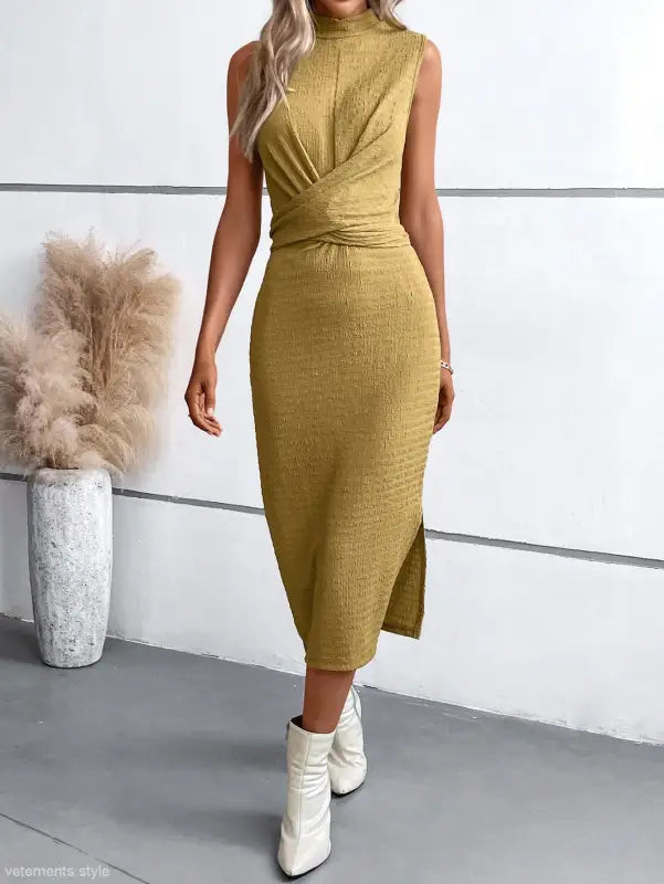 Mustard sleeveless midi dress with crossover bodice, perfect for elegant round neck slit dress fashion