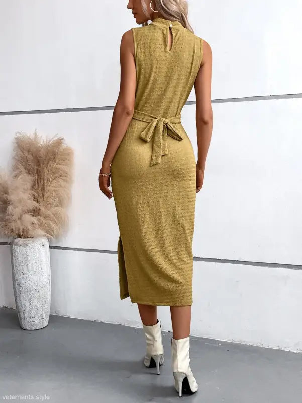 Elegant round neck slit dress in sleeveless mustard-colored midi attire for summer wear