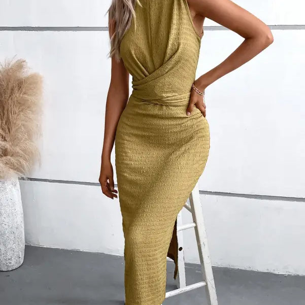Elegant round neck slit dress featuring a sleeveless gold midi design for summer wear