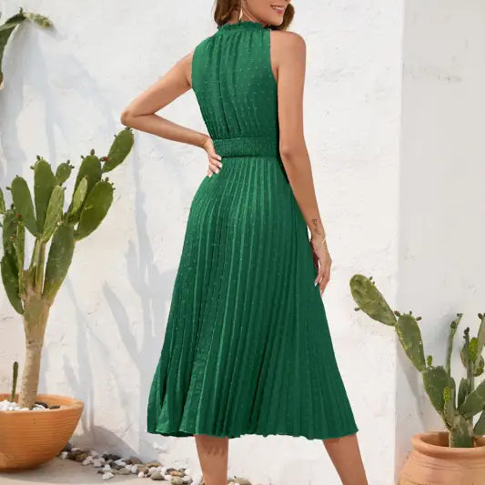 Green pleated maxi dress, perfect vacation dress for summer travel and stylish retreats