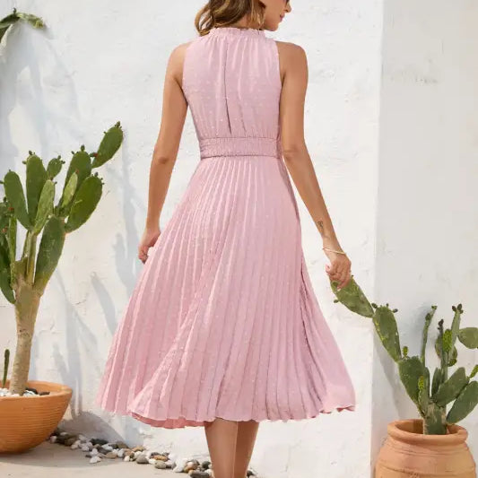 Pink pleated maxi dress ideal as a stylish vacation dress for summer getaways