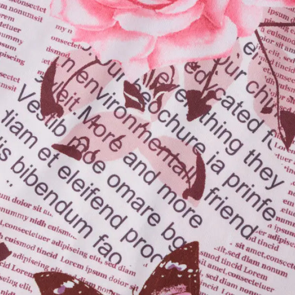 Floral fabric with newspaper print in an elegant ruffled high slit strap dress for summer parties