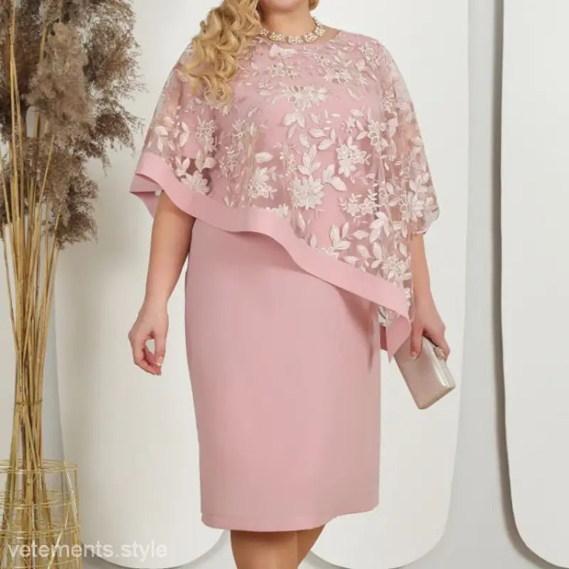 Plus-size blush pink knee-length formal dress with embroidered lace poncho overlay, perfect for elegant occasions