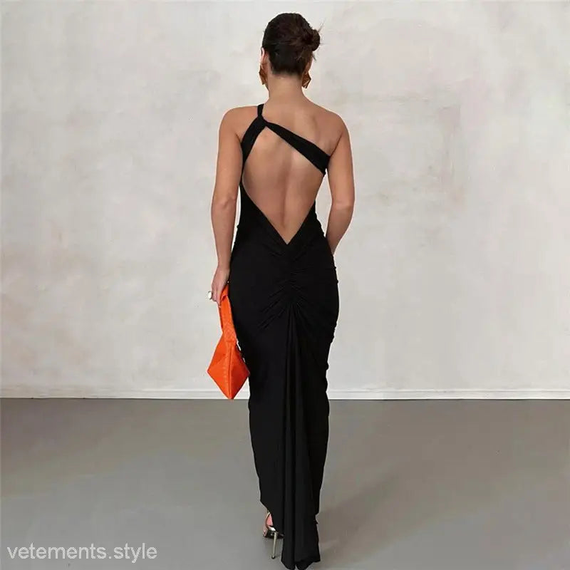 Elegant oblique shoulder backless black evening gown for summer, fits hips perfectly