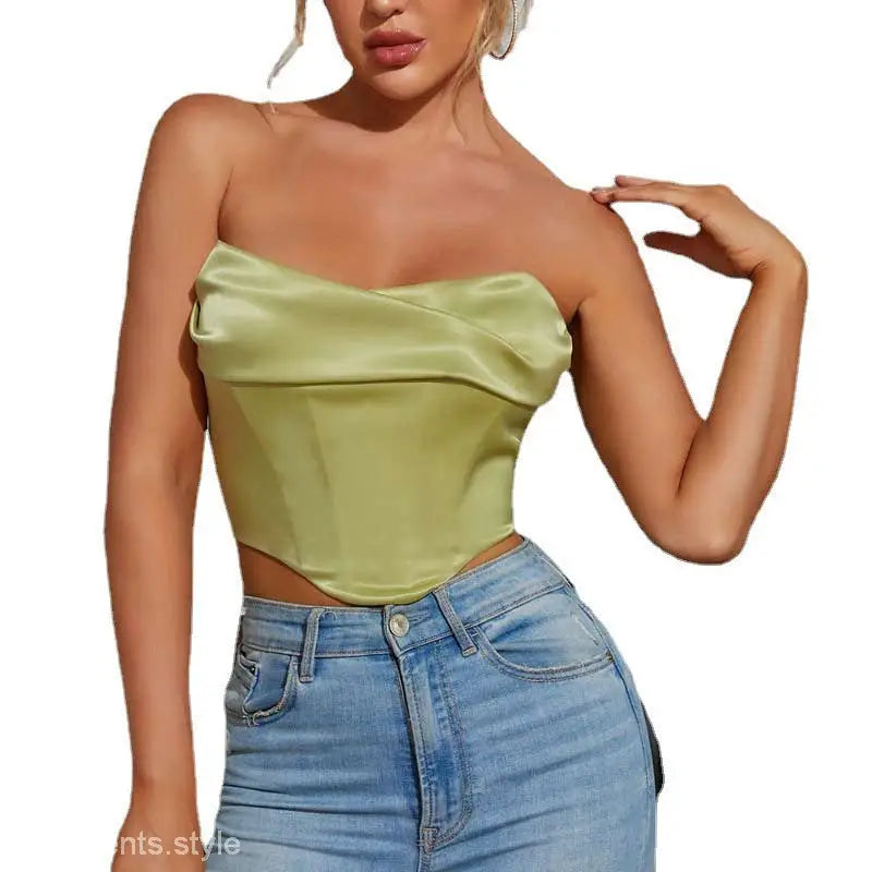 Lime green sexy pile boning corset tube top paired with high-waisted blue jeans