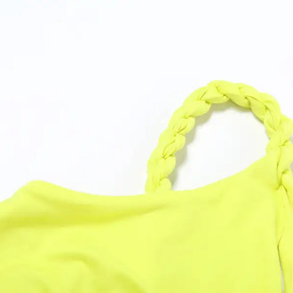 Neon yellow one-shoulder top with braided strap, ideal for elegant sexy slit dress events