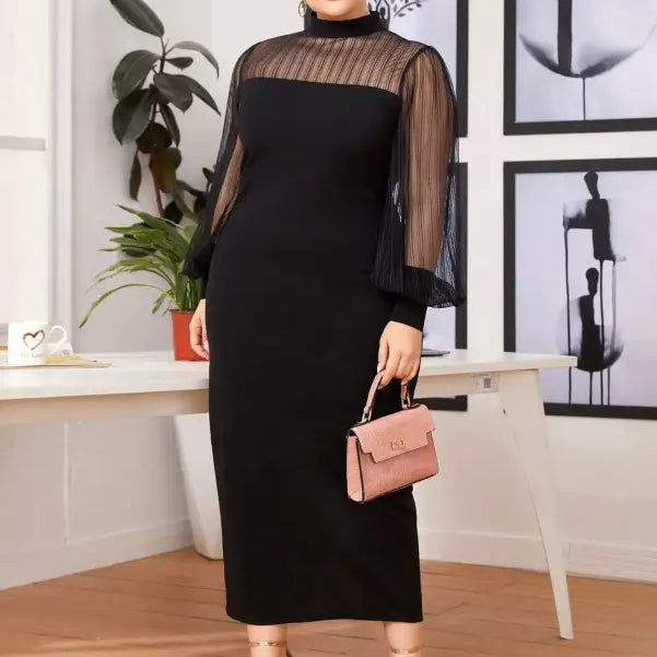 Elegant black midi dress with sheer sleeves and a high neckline.