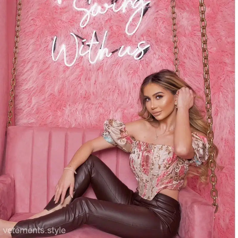 Elegant short sleeve floral corset top with puff sleeves and boning corset details