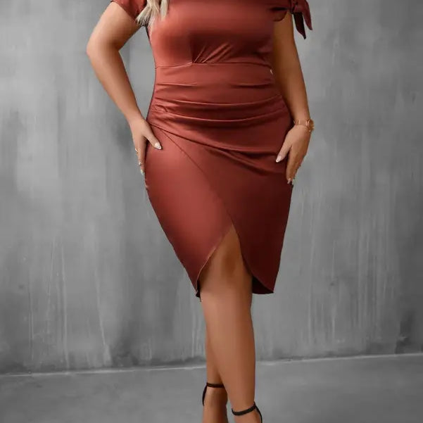 Rust-colored short sleeve sheath dress with ruched details and side slit perfect for a diva sexy dress