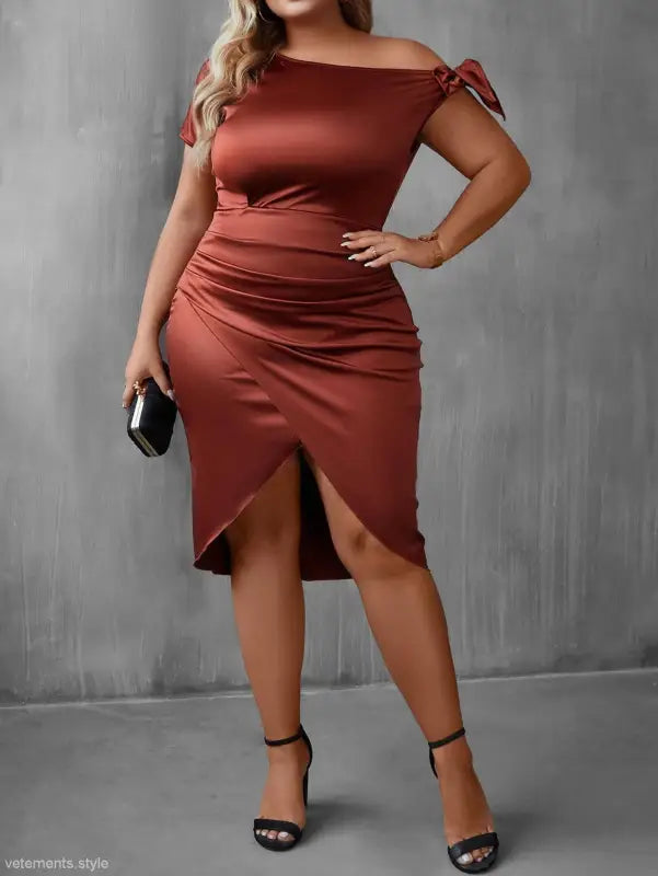 Rust-colored off-shoulder dress with side slit and ruched details, perfect for a diva sexy dress or short sleeve sheath occasion