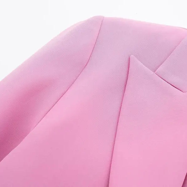 Pink blazer lapel and shoulder of elegant short small blazer suit for casual wear