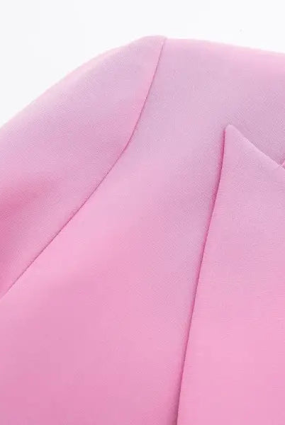 Pink blazer lapel and shoulder of elegant short small blazer suit for casual wear