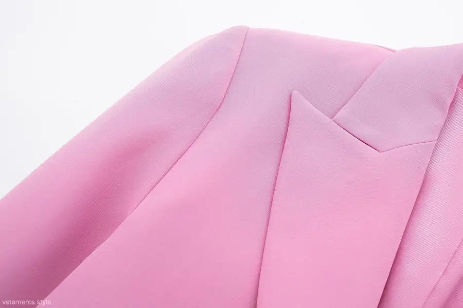 Pink blazer lapel and shoulder of elegant short small blazer suit for casual wear
