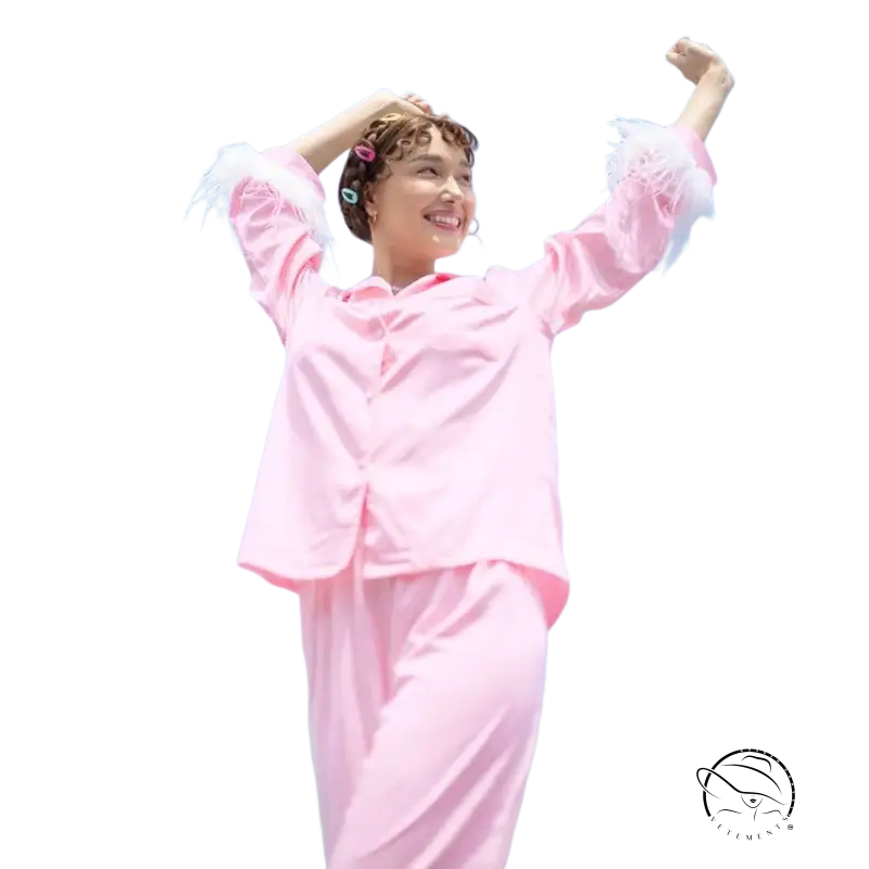 Elegant silk ostrich feather pajamas set in pink satin with feathered cuffs