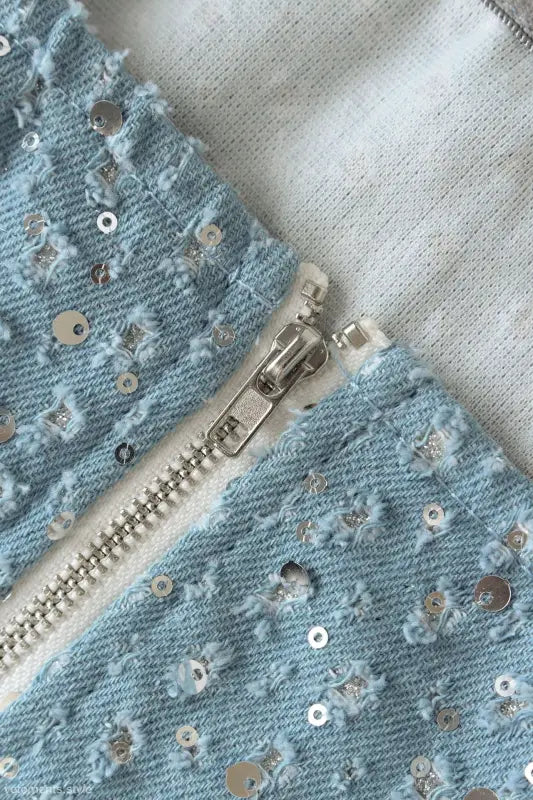 Light blue denim fabric with silver sequins and zipper for elegant denim wide leg pants