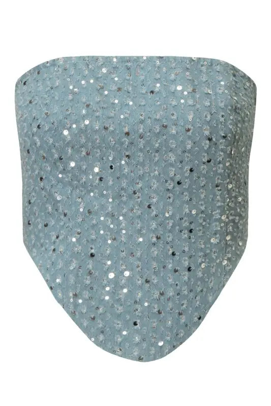 Pale blue sequined strapless crop top paired with wide leg pants for elegant spring style