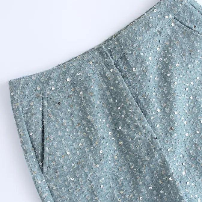 Light blue sequined wide leg pants with pockets, perfect for elegant denim fashion