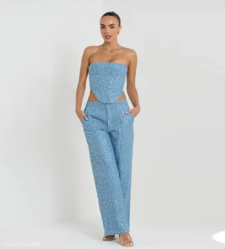 Light blue sequined strapless top with matching wide leg pants for elegant denim style