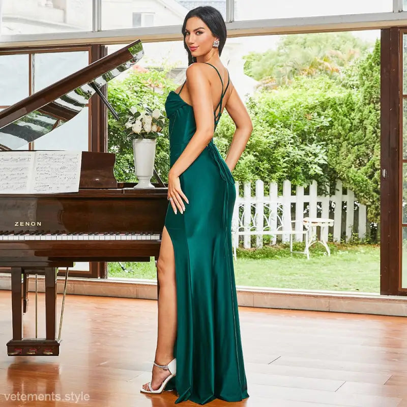 Elegant emerald green slim fit bridesmaid dress with high slit and spaghetti straps