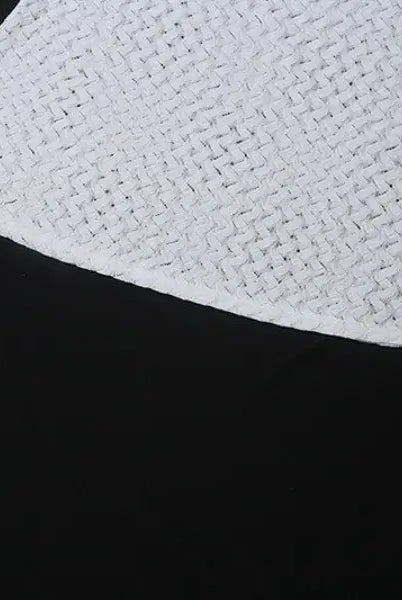 White crocheted triangular cloth of an elegant slim fit evening dress with backless design