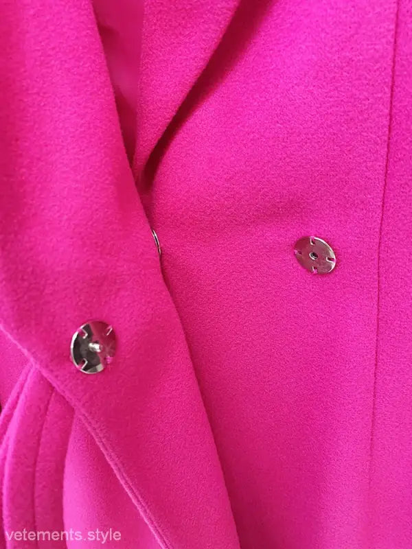 Bright pink star woolen coat featuring silver buttons and a slim fit bow detail