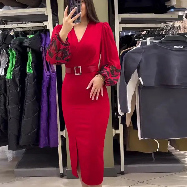 Red midi dress with a v-neck, puff sleeves, and a rhinestone-studded belt.