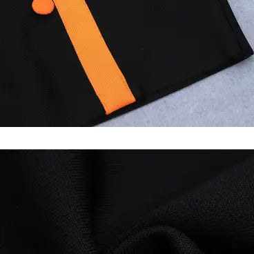 Black blazer with orange trim paired with sexy Vetements dress for a stylish look