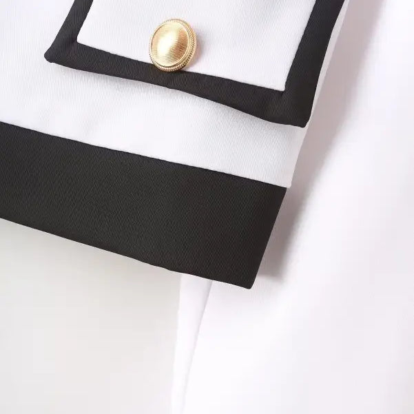 White blazer suit with snow white blazer sleeve, black trim, and gold button detail