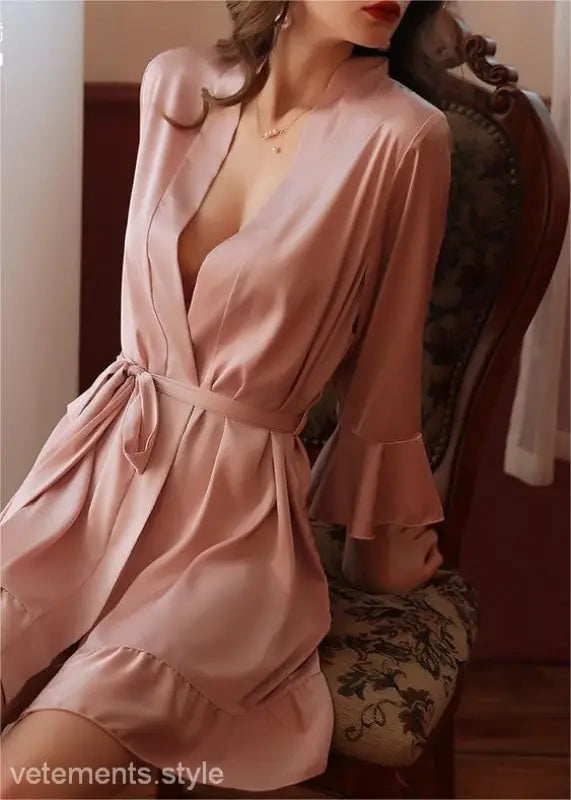 Pale pink silk lotus pajamas with plunging neckline, ruffled sleeves, and belt for spring fall