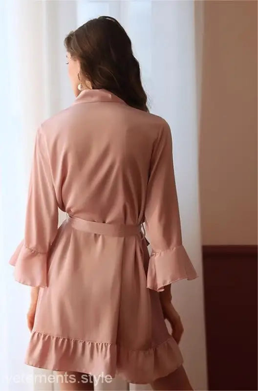 Pink robe with ruffled sleeves and hem, tied at waist, ideal for sexy silk lotus pajamas