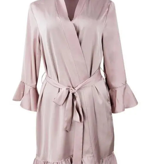 Pale pink satin robe with ruffled sleeves, inspired by silk lotus pajamas for elegant spring and fall wear